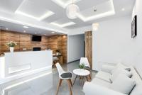 Televízia a/alebo spoločenská miestnosť v ubytovaní Resort Holiday Home Centrum Opieki i Rehabilitacji
