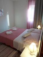 Posteľ alebo postele v izbe v ubytovaní Apartman Lapis