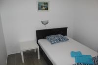 Postel nebo postele na pokoji v ubytování Apartment Tonka