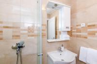 Koupelna v ubytování Rooms Baza