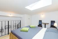 Postel nebo postele na pokoji v ubytování Rooms Baza
