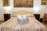 Posteľ alebo postele v izbe v ubytovaní B&B Maria Piddu