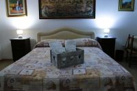 Posteľ alebo postele v izbe v ubytovaní B&B Maria Piddu