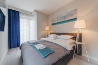 Posteľ alebo postele v izbe v ubytovaní P&O Corporate Serviced Apartments Cybernetyki