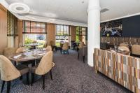 Posezení v ubytování Hostellerie Saint Vincent Beauvais Aeroport