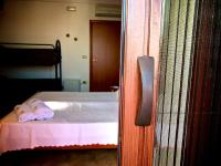 Posteľ alebo postele v izbe v ubytovaní B&B NiloSira