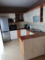 Kuchyň nebo kuchyňský kout v ubytování Apartments Mira