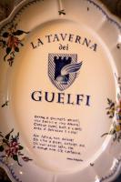 Taverna dei Guelfi tanúsítványa, márkajelzése vagy díja
