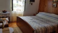 Posteľ alebo postele v izbe v ubytovaní Rooms Roza