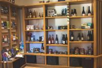 a room with shelves filled with bottles of wine at L&#39;Escale des Châteaux de la Loire in Angé