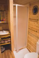 a bathroom with a shower and a sink at L&#39;Escale des Châteaux de la Loire in Angé