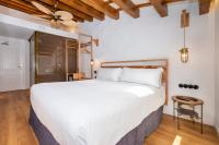 Posteľ alebo postele v izbe v ubytovaní Nao Catedral Boutique Hotel