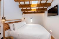 Posteľ alebo postele v izbe v ubytovaní Nao Catedral Boutique Hotel