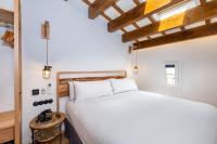 Posteľ alebo postele v izbe v ubytovaní Nao Catedral Boutique Hotel