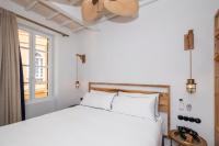 Posteľ alebo postele v izbe v ubytovaní Nao Catedral Boutique Hotel