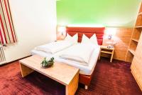 Posteľ alebo postele v izbe v ubytovaní Hotel Schladmingerhof