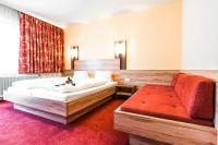 Posteľ alebo postele v izbe v ubytovaní Hotel Schladmingerhof