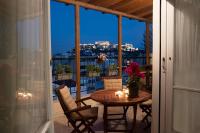 A balcony or terrace at Mosaics Astonishing Acropolis view Aprtm