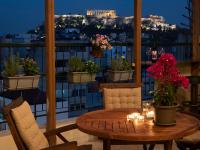 A balcony or terrace at Mosaics Astonishing Acropolis view Aprtm