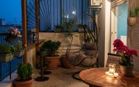 A balcony or terrace at Mosaics Astonishing Acropolis view Aprtm
