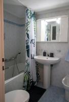 A bathroom at Mosaics Astonishing Acropolis view Aprtm