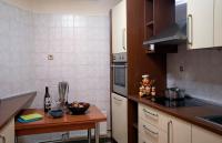 A kitchen or kitchenette at Mosaics Astonishing Acropolis view Aprtm