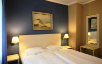 Postel nebo postele na pokoji v ubytování Hotel Pelikan