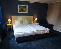 Postel nebo postele na pokoji v ubytování Hotel Pelikan