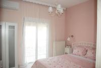 A bed or beds in a room at Vintage Home