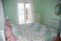 A bed or beds in a room at Vintage Home