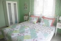 A bed or beds in a room at Vintage Home