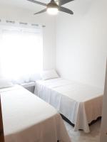 Postel nebo postele na pokoji v ubytování Appartement avec Solarium