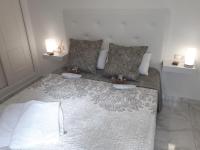 Postel nebo postele na pokoji v ubytování Appartement avec Solarium