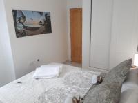 Postel nebo postele na pokoji v ubytování Appartement avec Solarium