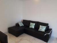 Posezení v ubytování Appartement avec Solarium