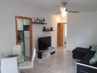 TV a/nebo společenská místnost v ubytování Appartement avec Solarium