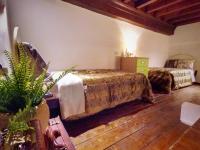 Posteľ alebo postele v izbe v ubytovaní Florentine Style Central Apartments