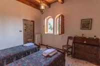 Posteľ alebo postele v izbe v ubytovaní La Villa di Torraiolo