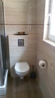 Kúpeľňa v ubytovaní Apartman Viktorija