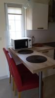 Kuchyňa alebo kuchynka v ubytovaní Apartman Viktorija