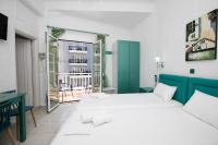A bed or beds in a room at Kallithea Studios