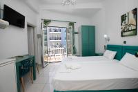 A bed or beds in a room at Kallithea Studios