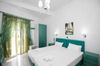 A bed or beds in a room at Kallithea Studios