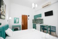 A bed or beds in a room at Kallithea Studios