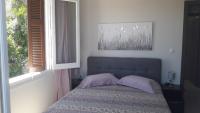 Posteľ alebo postele v izbe v ubytovaní Aggeliki Apartments