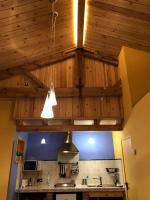 Kuchyň nebo kuchyňský kout v ubytování Els Apartaments del bosc