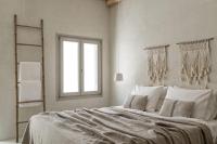 Posteľ alebo postele v izbe v ubytovaní Giacomo Home by Rocks Estates