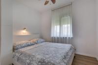 Posteľ alebo postele v izbe v ubytovaní Apartment Marul