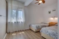Posteľ alebo postele v izbe v ubytovaní Apartment Marul