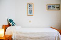 Posteľ alebo postele v izbe v ubytovaní Seaview Risco de Famara 1